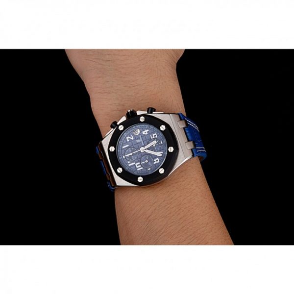 blue ap watch on wrist